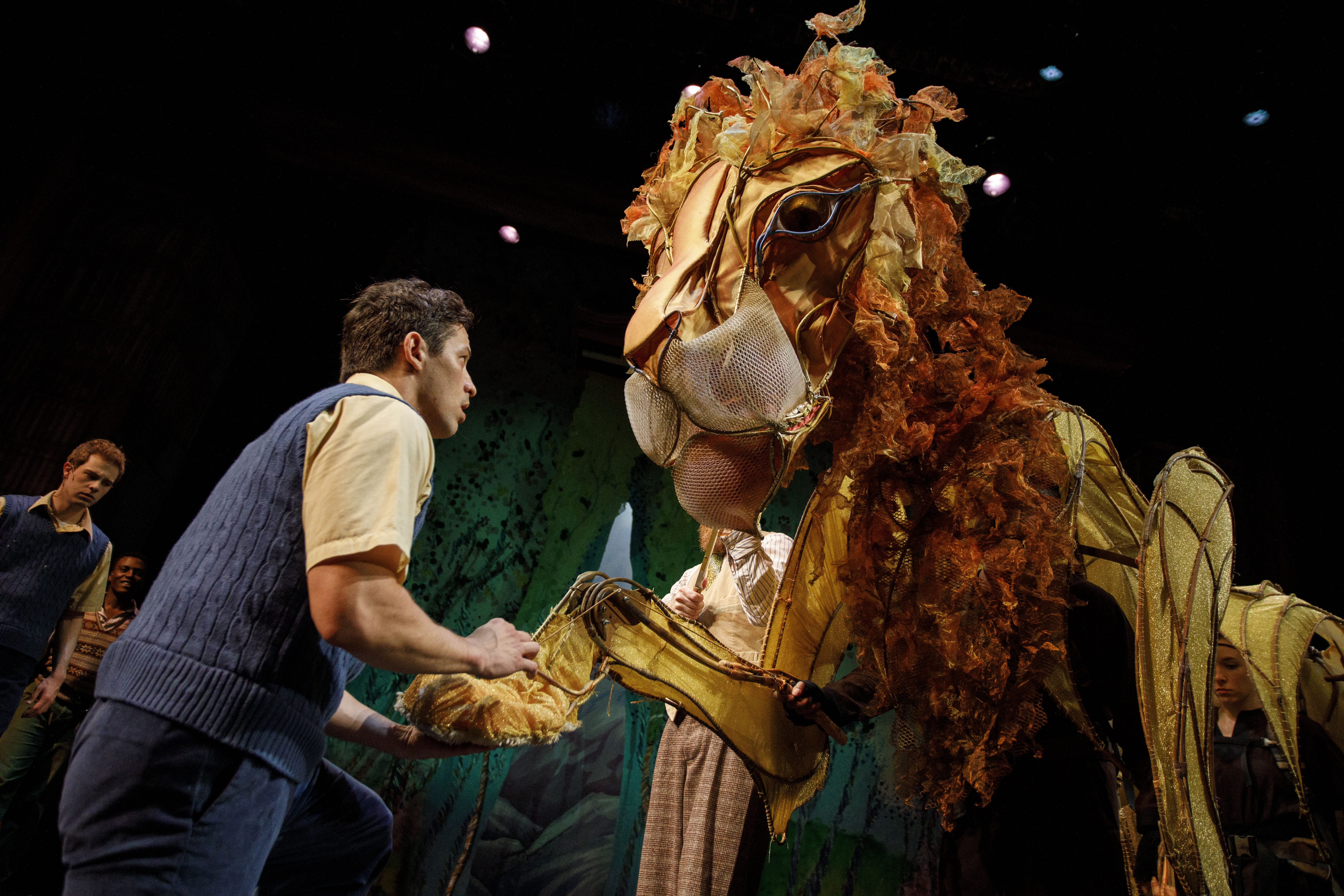 Ryan Sellers as Edmund Pevensie (dancer) with Aslan the Lion.